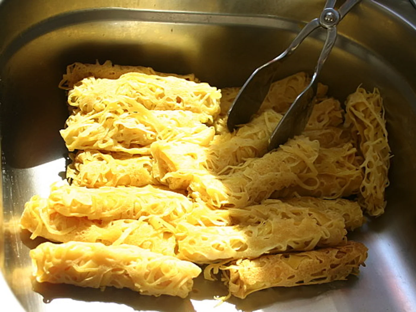 Roti Jala (Malaysian Lacy Pancakes) prepared recipe