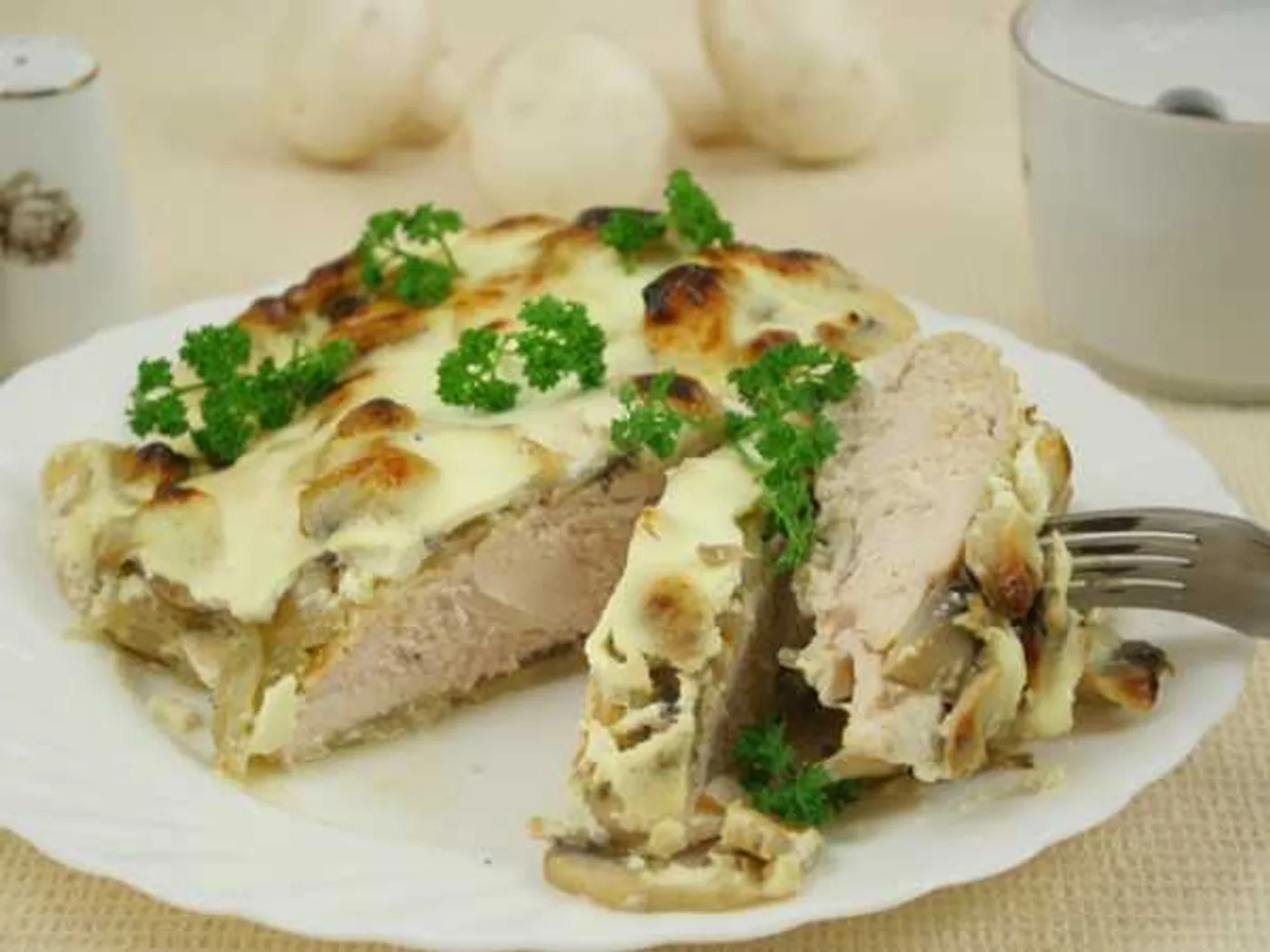 Chicken fillet baked with mushrooms and sour cream recipe