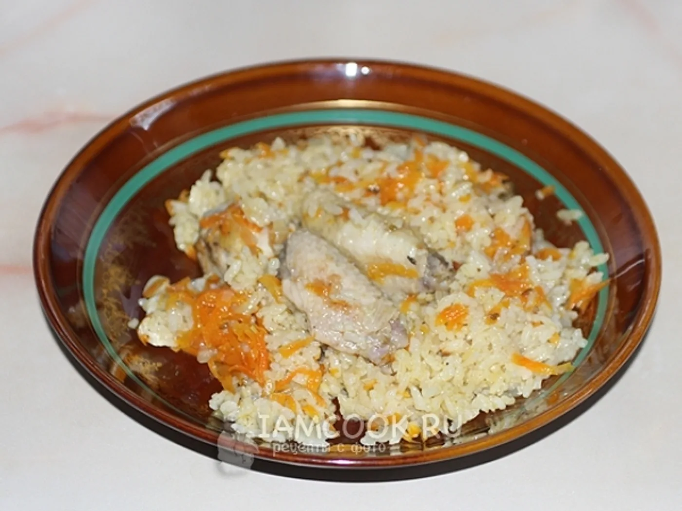 Chicken winged pilaf in a pan recipe