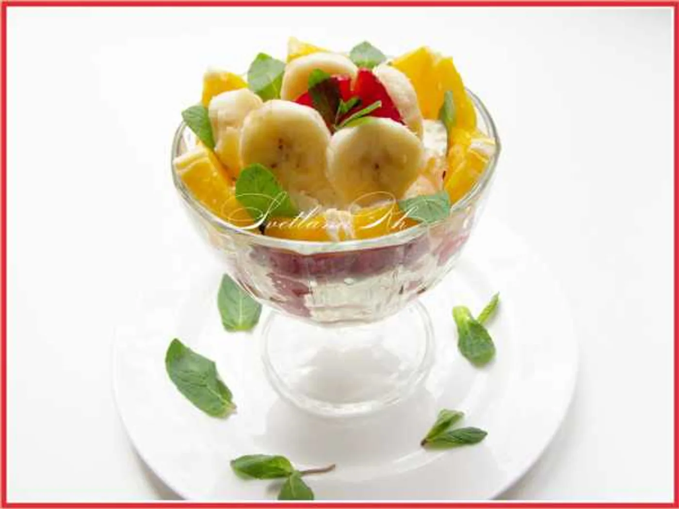 Fruit dessert with ice cream and mint recipe