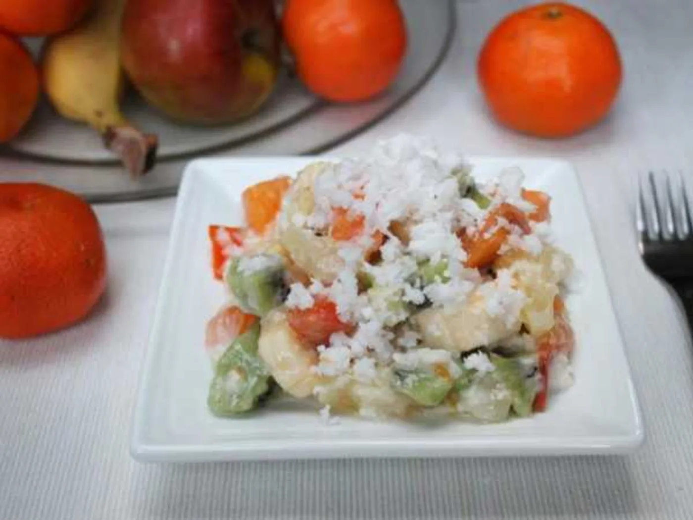 Fruit salad with coconut shavings recipe