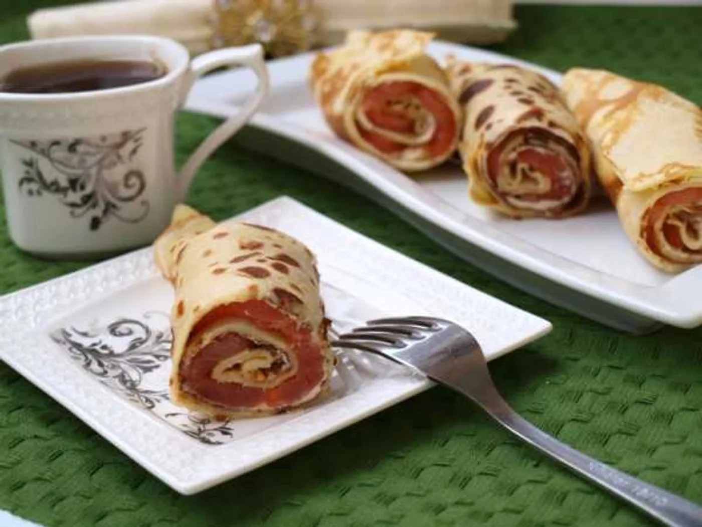 Pancakes with salmon and melted cheese recipe