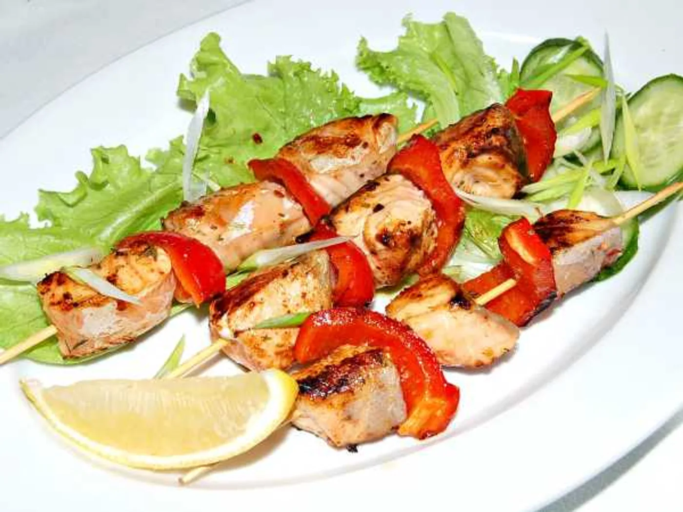 Salmon kebab in a pan on skewers recipe