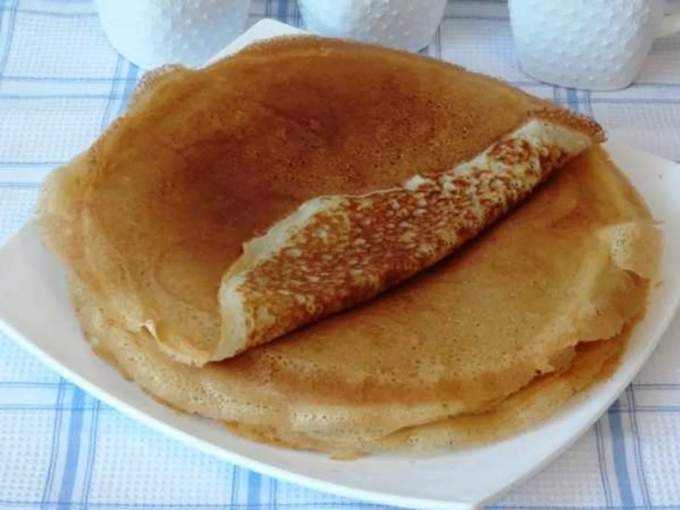 Simple yeast pancakes on milk recipe