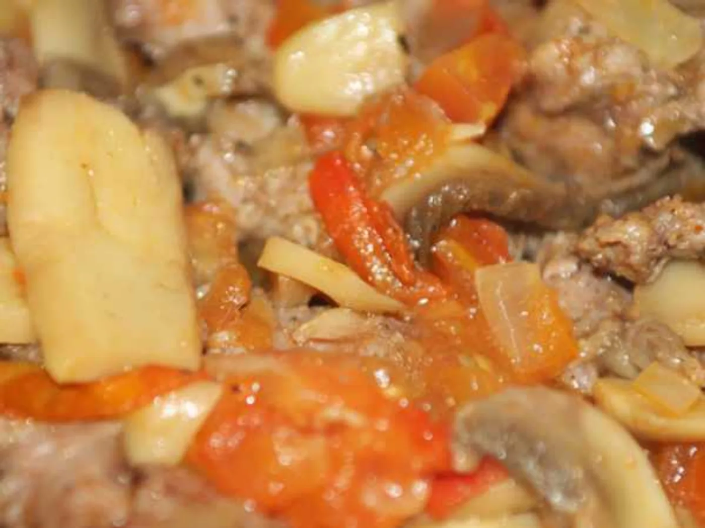 Veal stewed with mushrooms in the oven recipe