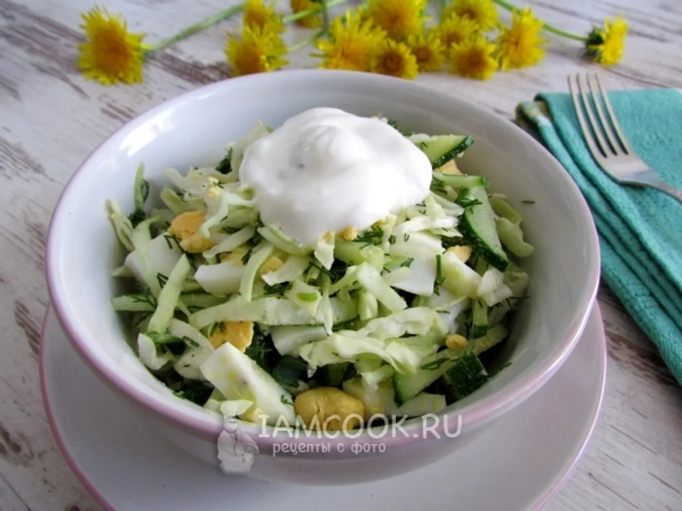 Young cabbage salad with cucumber, eggs and greens recipe